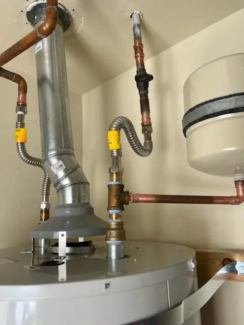 Water heater installation and plumbing repair in Westside Village